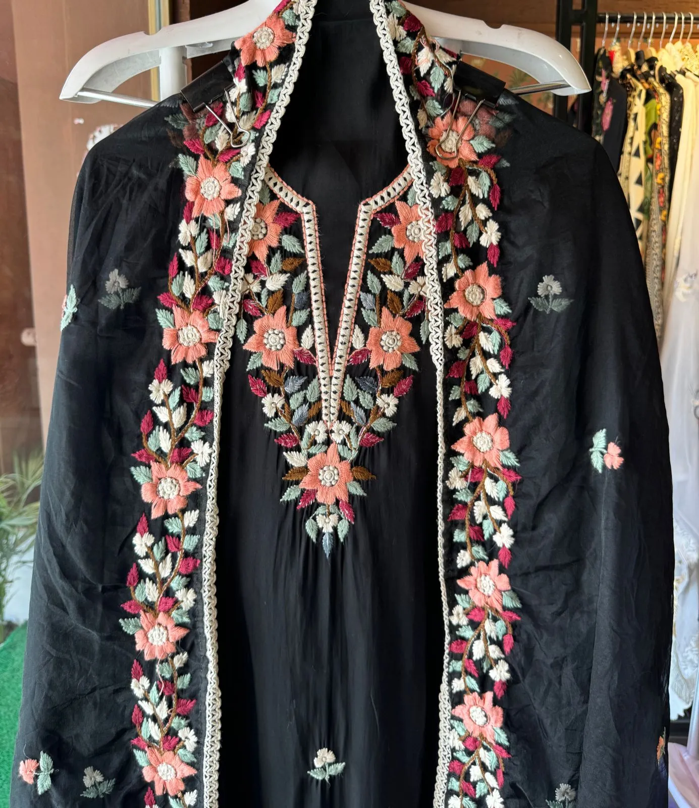 Soft cotton muslin shirt with thread embroidery done on the neckline  And booties on the shirt